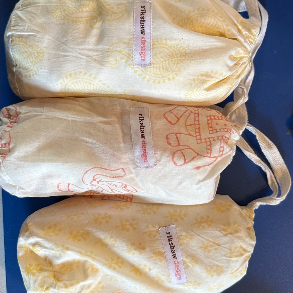 Rikshaw Design Yellow and Pink Crib Sheets (set of 3)